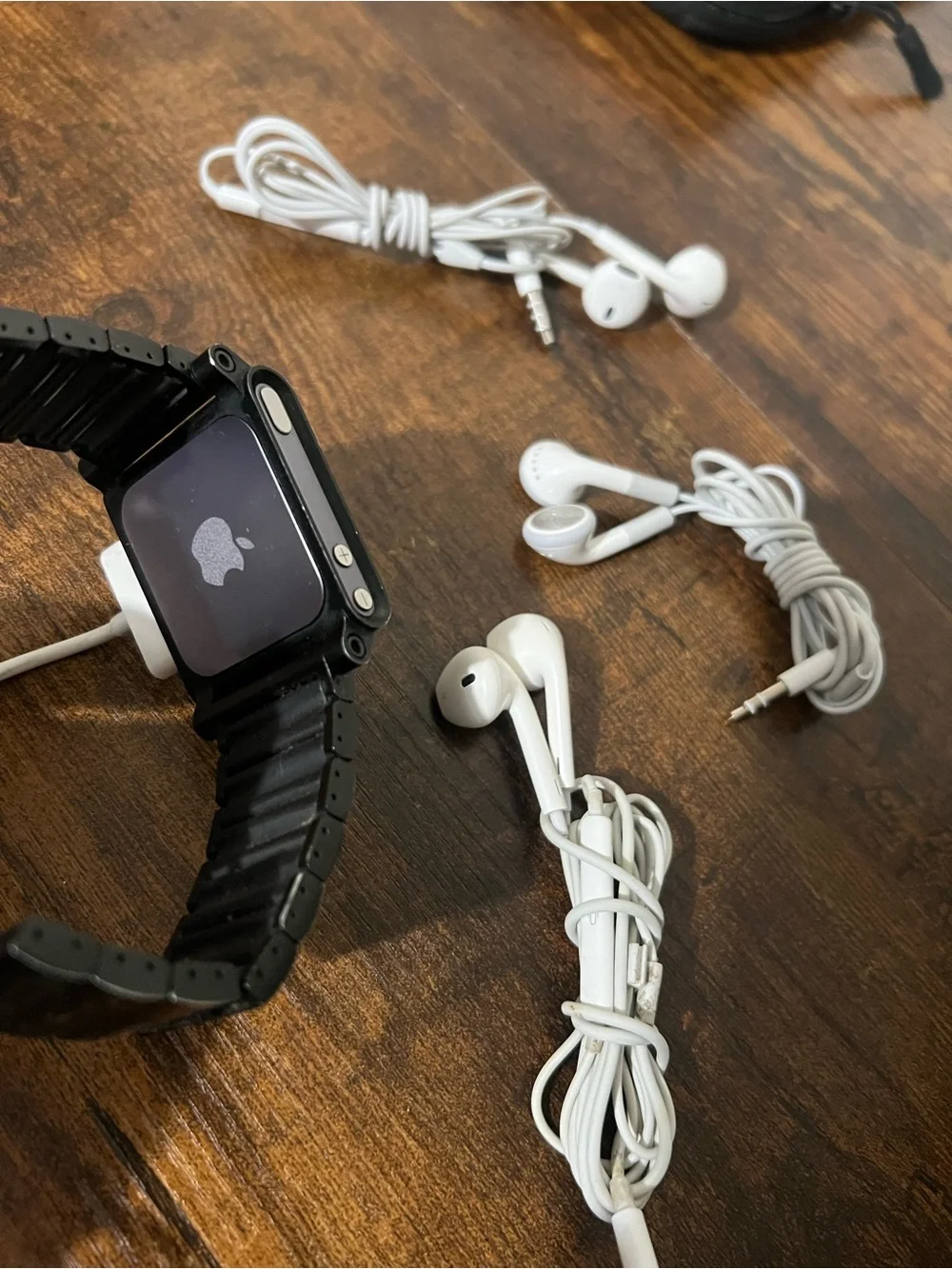 Apple Black iPod Nano with White Earbuds